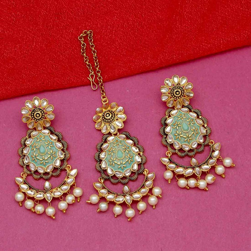 rama green earrings and maang tikka