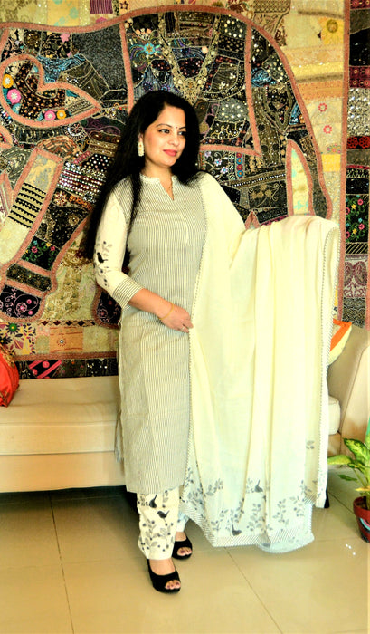 Daisy white kurta in black stripes with mul cotton dupatta and pants with bird print details