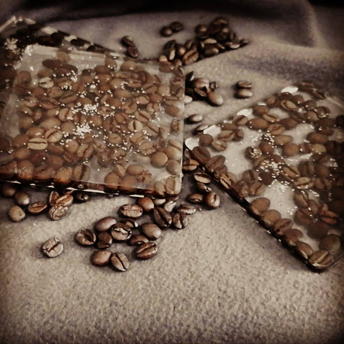 Coasters with coffee beans